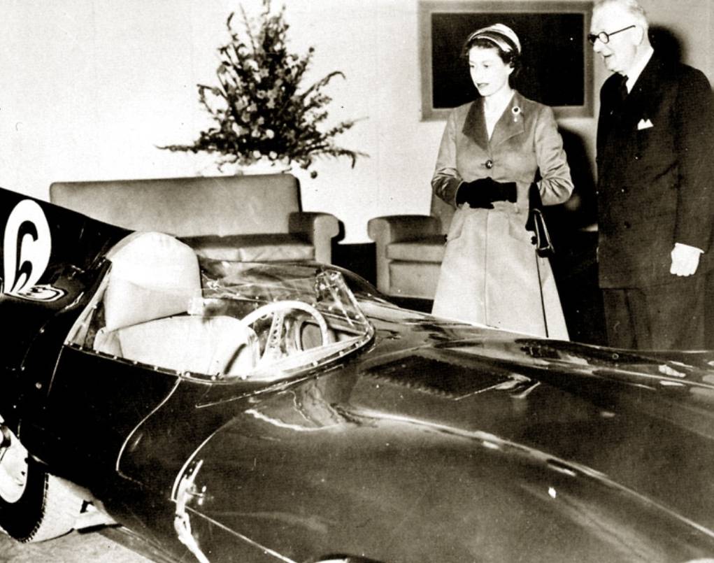 William Lyons shows Queen Elizabeth II the Jaguar D-Type